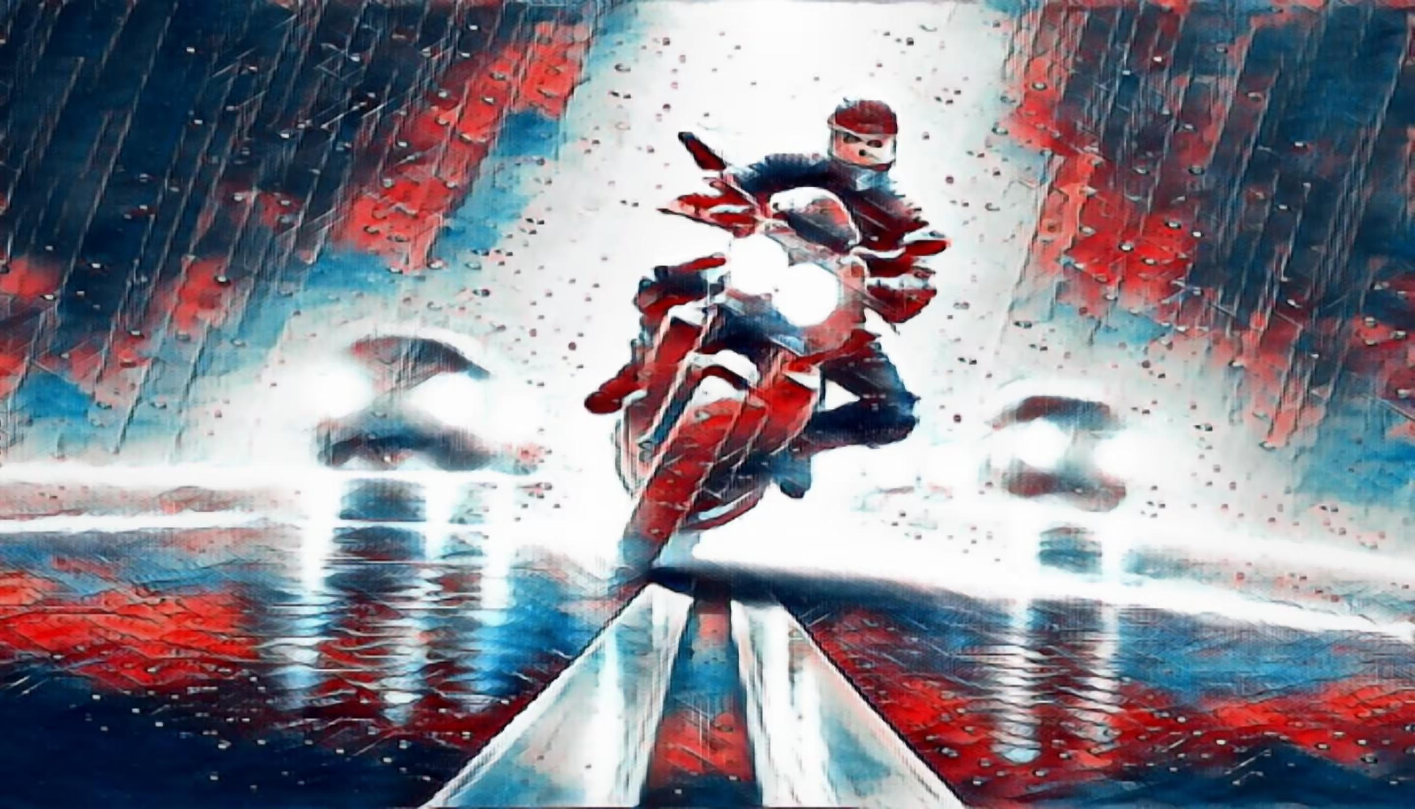 A motorcyclist splitting lanes on a California highway
